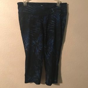 Blue and black palm tree patterned workout pants